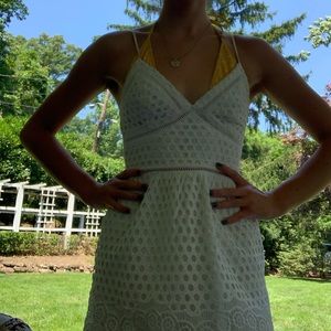 Elegant White textured mini dress with cut outs